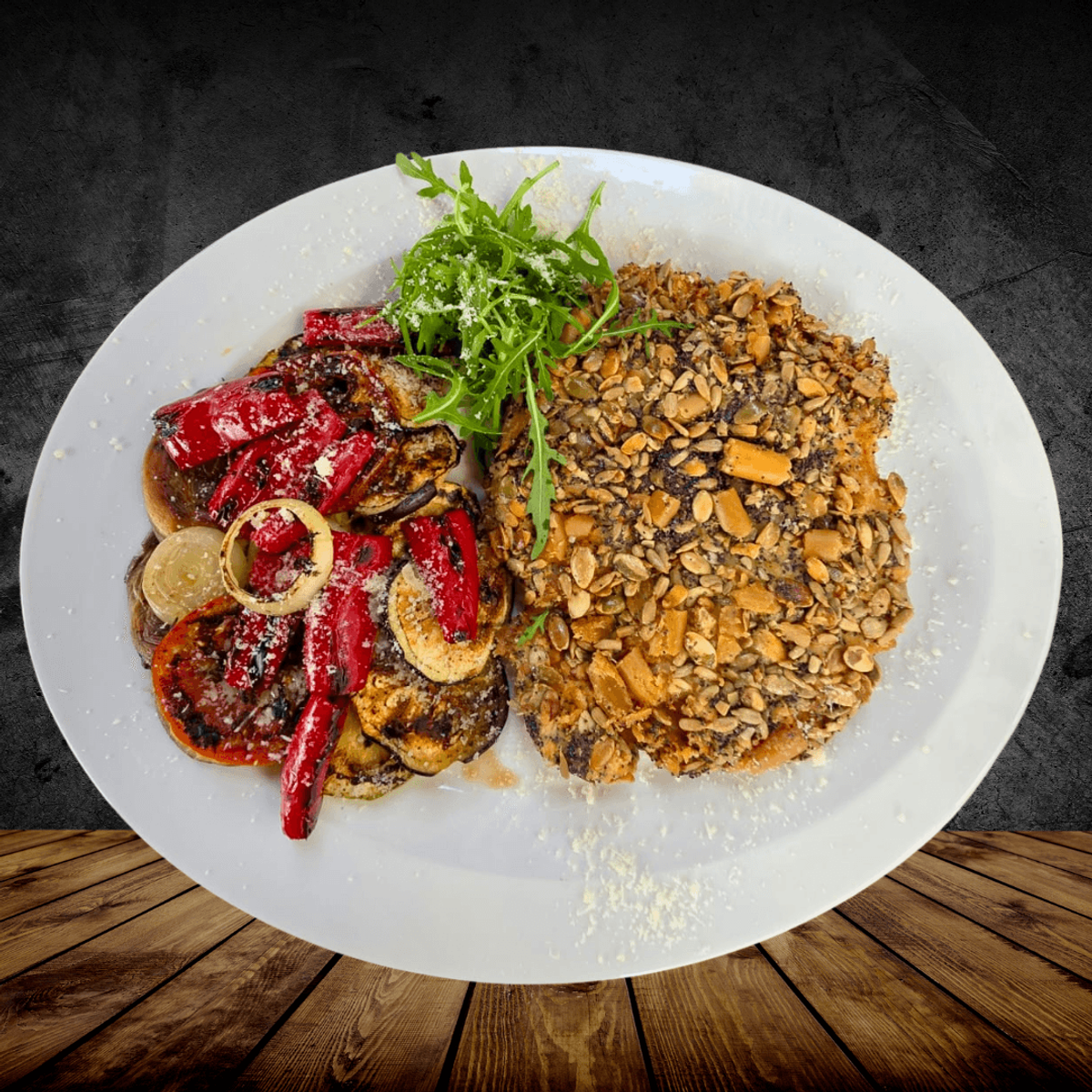 Șnițel de Pui în Crustă de Semințe cu Legume la Grătar si Salată de Rucola